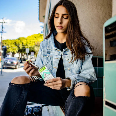 Chief_Stix_Mentol_Hemp_Non-nicotine cigarette alternatives​_with_woman_on_street